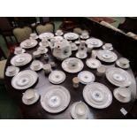 An Adams English Ironstone blue and white floral design part dinner service