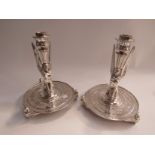 A pair of Elkington plate sphinx style candlesticks,