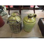 Two stoneware flagons including Benskin's Watford Brewery in wicker holder