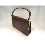 A 1960's snakeskin handbag by Lightstone Hubbard.