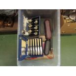 A canteen of matched cheese and table knives (36) in a flame mahogany fitted case,