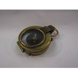A WWI brass compass marked E.