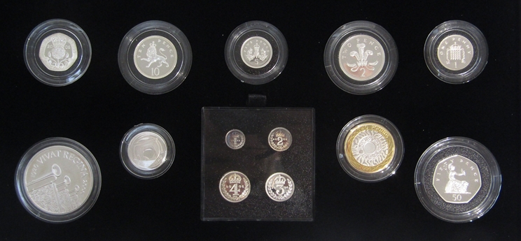 A cased Royal Mint silver proof coin set "The Queen's 80th Birthday Collection" includng £5, £2, £1, - Image 2 of 2