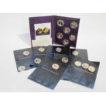A collection of British Numismatic Treasury issue commemorative coins of Elizabeth II