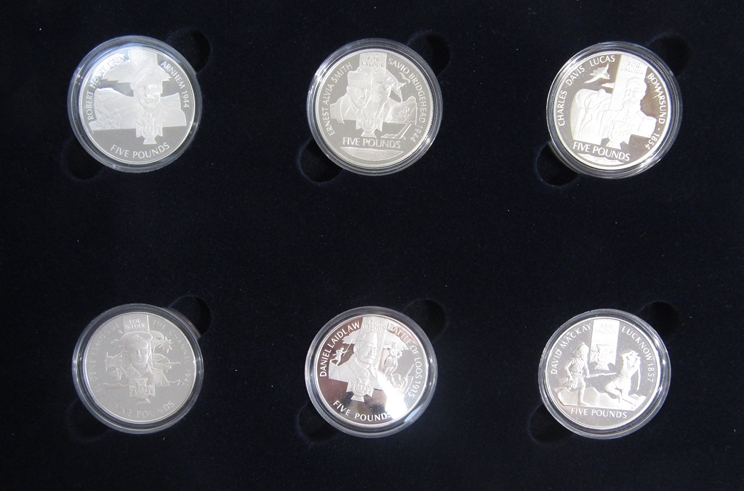 A cased Royal Mint "The Victoria Cross" £5 silver proof 18 coin set with documentation - Image 2 of 2