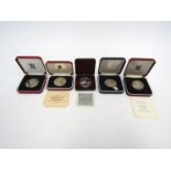 Four silver proof coins including St Helena Tercentenary and Queen Elizabeth Queen Mother 1 dollar