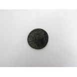 A 1657 trade token of New Buckenham,