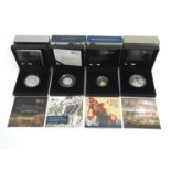 Four boxed Royal Mint silver proof coins including Battle of Waterloo £5 200th Anniversary and D