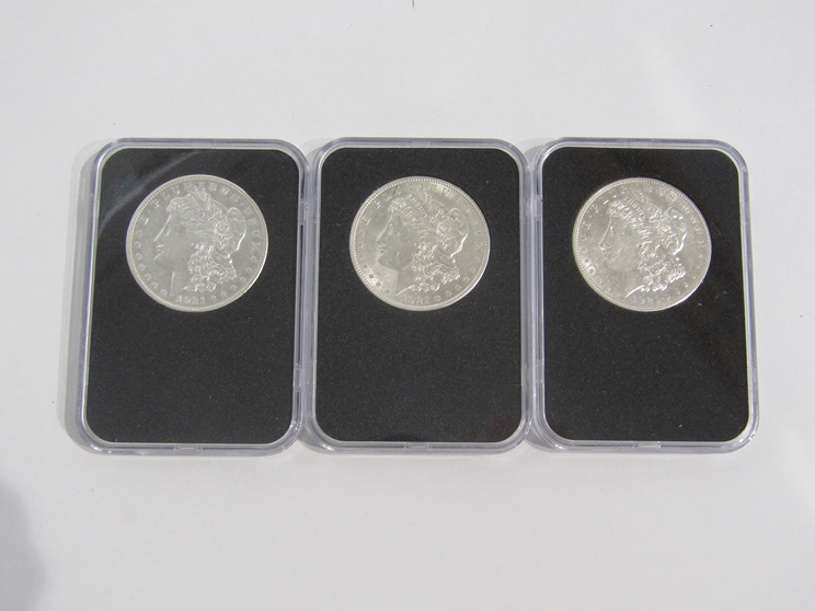 Three US silver Morgan dollars, Philadelphia, cased and boxed, - Image 3 of 3