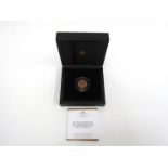 An Edward VII gold sovereign, 1902 coronation year, presented by The London Mint,