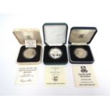 Three silver proof Falkland Islands related coins including Mount Pleasant Airport