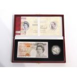 A Royal Mint and Bank of England £10 note and silver proof crown set, limited edition,