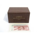 A box containing the official presentation sets of specimen banknotes from around the world,