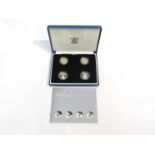 A Royal Mint Uk Britannia 2004 silver proof four £1 coin pattern set,