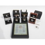 A collection of London Mint presentation cases of historical British coins including hammered