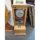 A clocking-in clock dial marked Egypt,