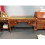 An Edwardian mahogany writing desk,