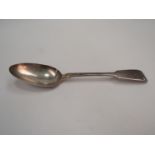A silver table spoon,