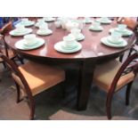 A large circular three leg dining table 160cm diameter x 75.