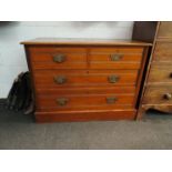 A Circa 1900 satin walnut chest of two short over two long drawers, plinth base.