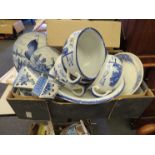 A box of blue and white ceramics, most with windmill decoration, chamber pots, wash bowl,