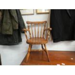 An early 20th Century childs windsor stickback chair,