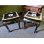A pair of 20th Century oriental lacquered side tables,