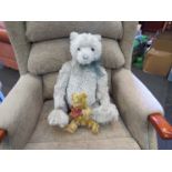 A Grand Mohair Collection teddy bear and a smaller Gund bear (2)