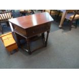 A modern oak Jacobean style side table with single drawer,