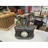 A mantel clock with resin bronze horses to top, clock a/f,