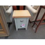 A pair of oak topped painted bedside cabinets