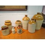 Four stoneware flagons,