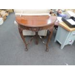 A 20th Century mahogany console table and coffee table