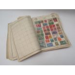 A stamp album with contents together with WWI sweetheart postcards