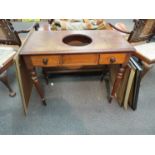 A Victorian mahogany washstand with insert top over two frieze drawers,