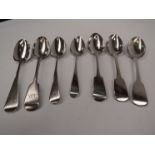 Seven various Georgian and later silver serving spoons,