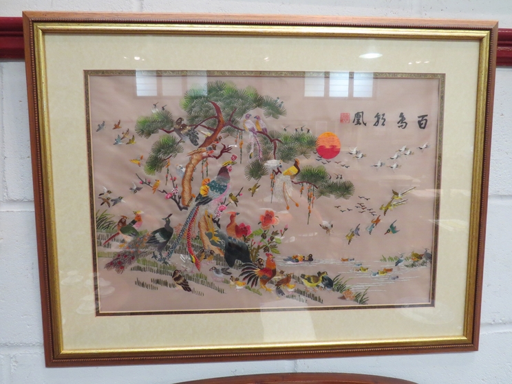 A Chinese silk embroidery of birds, framed and glazed,