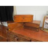 A Victorian walnut writing box with brass mounts and tooled leather slope