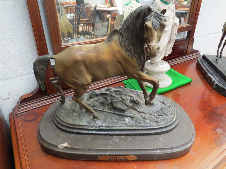 A cold cast bronze model of a Stallion by P.