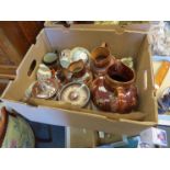 A box containing two tone earthernware, jugs, teapot,