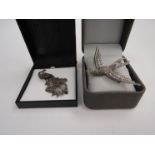 Two marcasite set brooches,