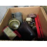 A box of miscellaneous including tankard, brass bowls, clock in a book,