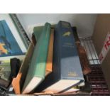 A box containing assorted books including Norfolk,