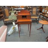 An Edwardian lady's desk with pigeon hole units,