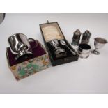 A silver Christening set comprising of napkin ring, spoon and egg cup,