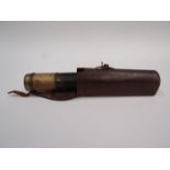 A leather cased telescope