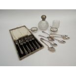 A selection of silver plated and silver necked/rimmed examples including spoons,