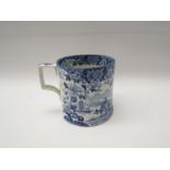 A 19th Century blue and white mug,