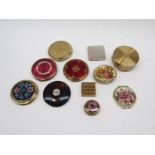 A box of vintage compacts
