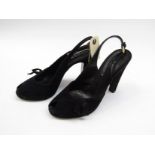 PRADA: A pair of black suede 1940's style shoes